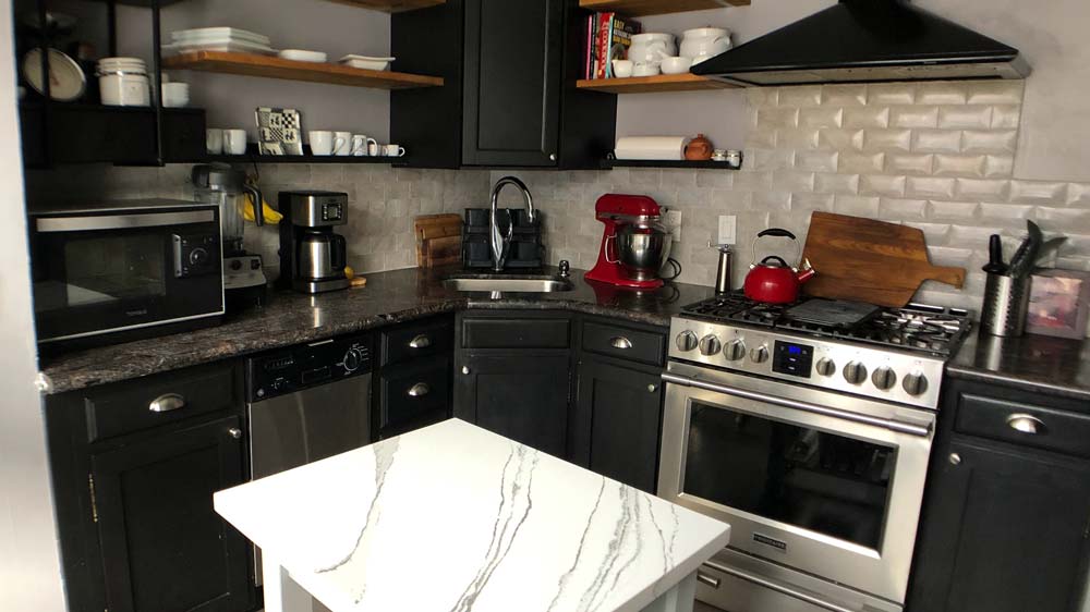 A kitchen with a stainless steel oven